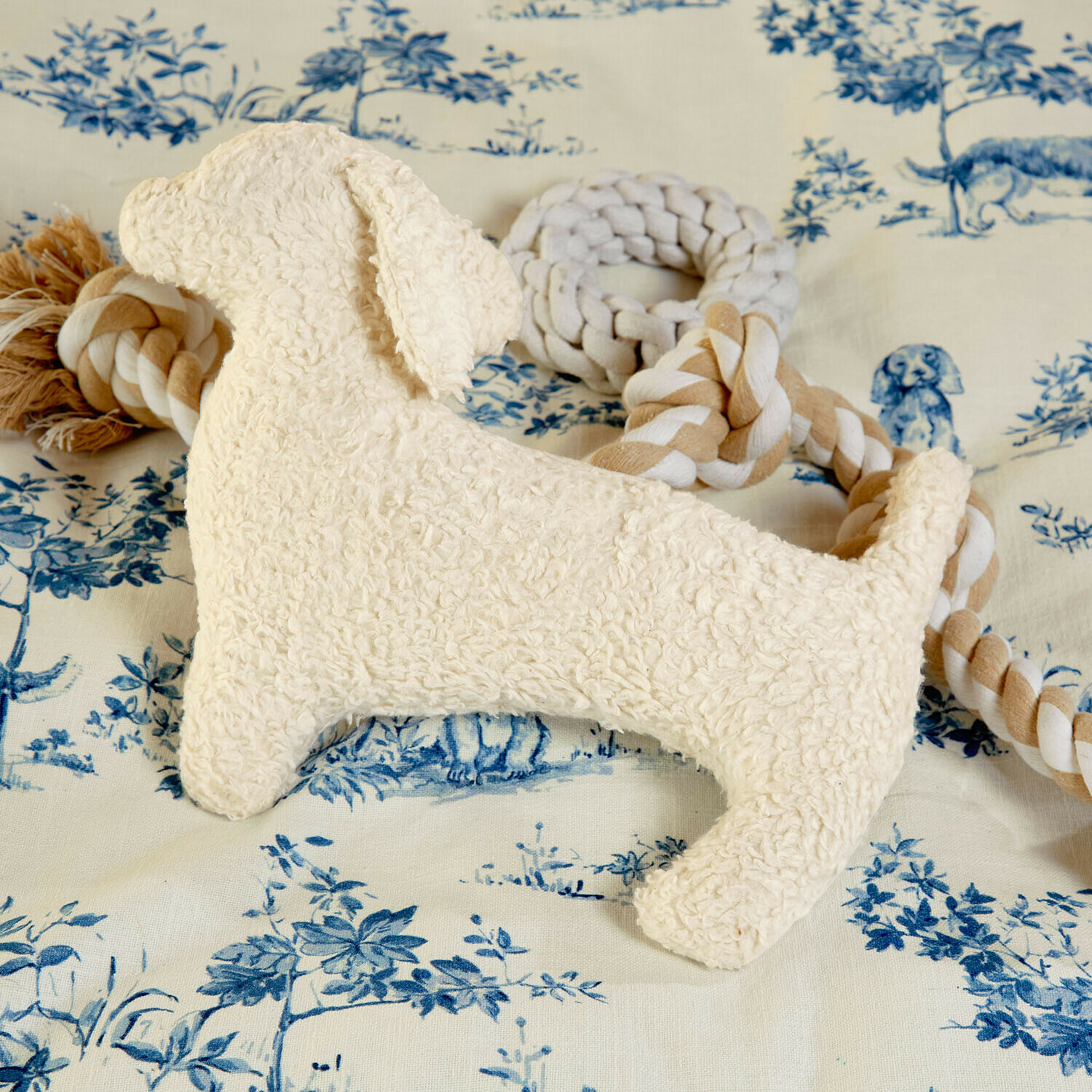 Krémová plyšová hračka ve tvaru psa s bavlněným uzlovaným lanem pro psy