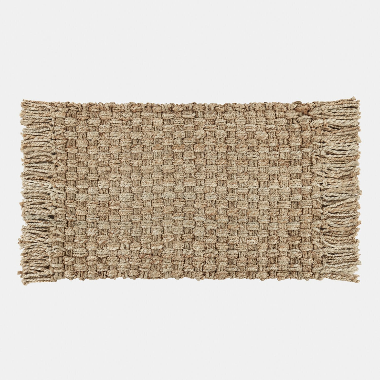 Ručně tkaný koberec z přírodní jutové příze v béžové barvě s třásněmi, dekorace interiéru