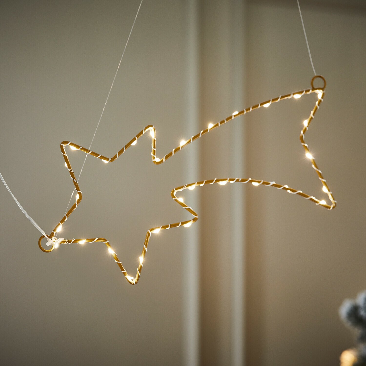 Padající hvězda s LED Glittera Zlatá světelná dekorace ve tvaru padající hvězdy s teplými bílými LED, vánoční ozdoba