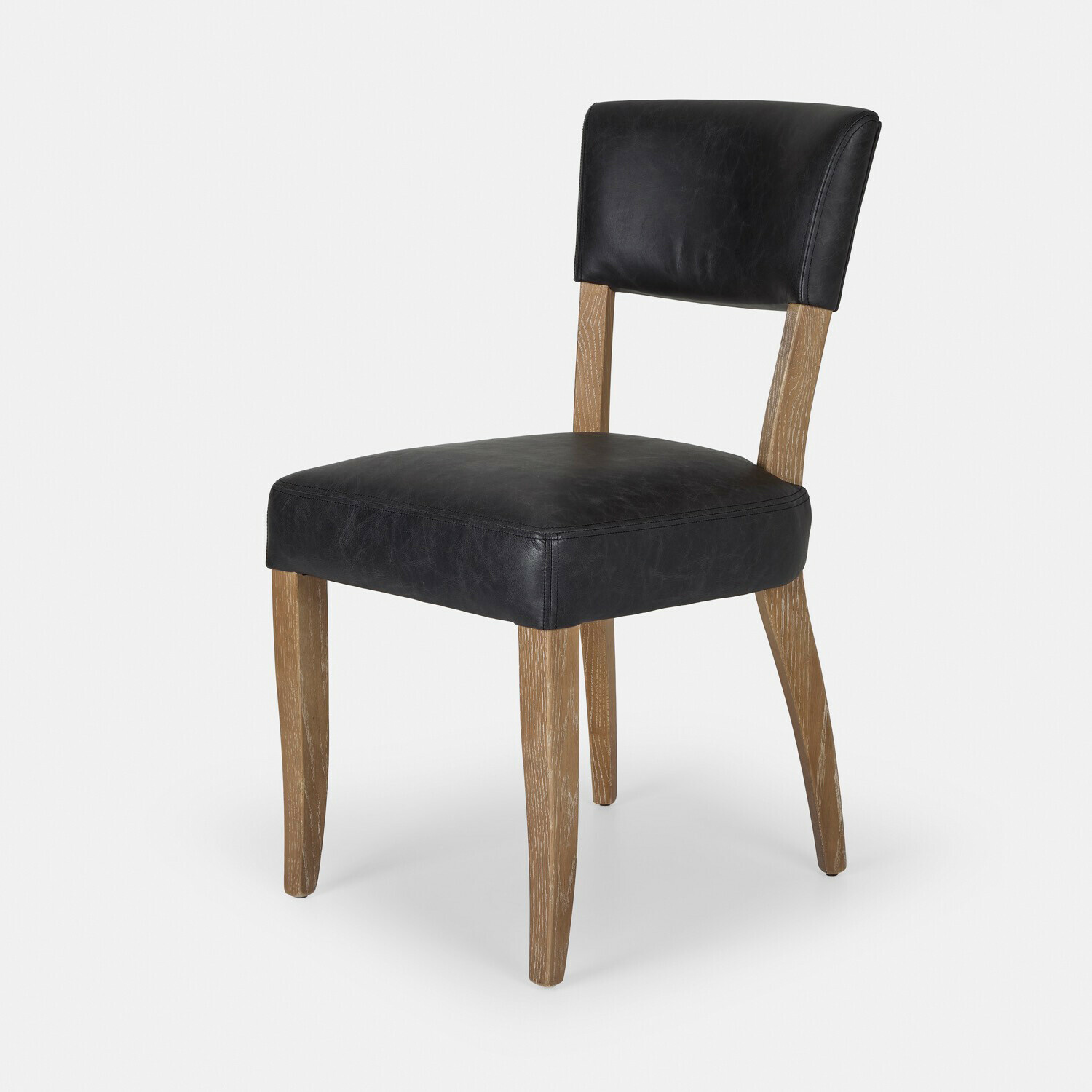 Židle Norevaux Židle s černou koženou sedací plochou a dřevěnými nohami, moderní design do jídelny či kanceláře