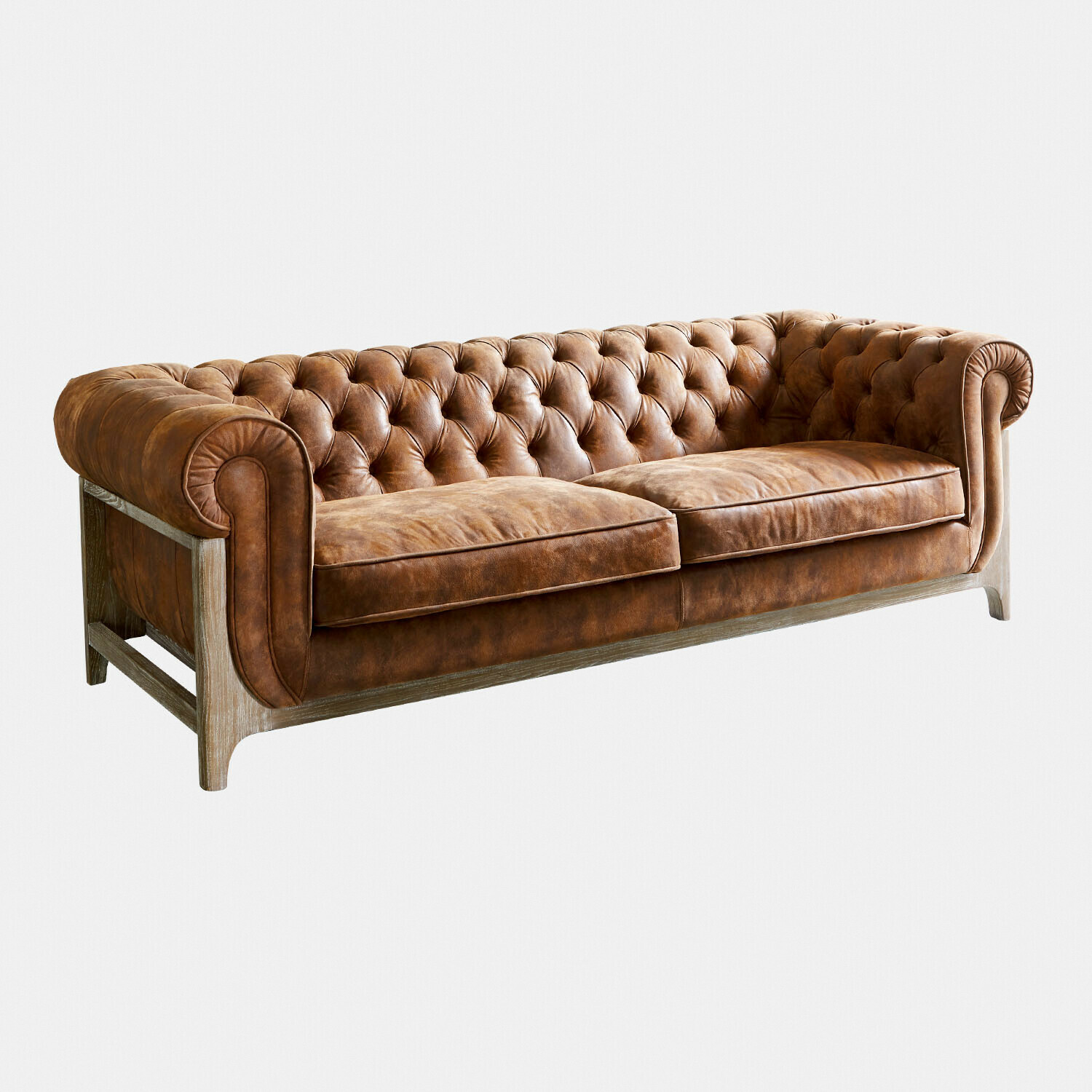 Hnědá kožená pohovka Swansboro s prošívaným opěradlem a dřevěným rámem do obýváku